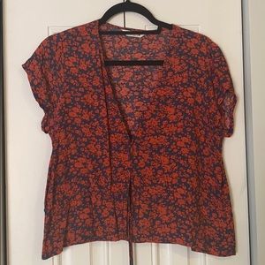 Floral low cut top with waist cinch